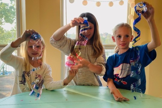 Cindy’s daughters Emma, Bella, and Grace give a conservation craft tutorial.